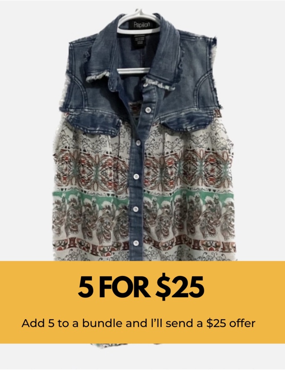 Sheer sleeveless button up with denim trim.